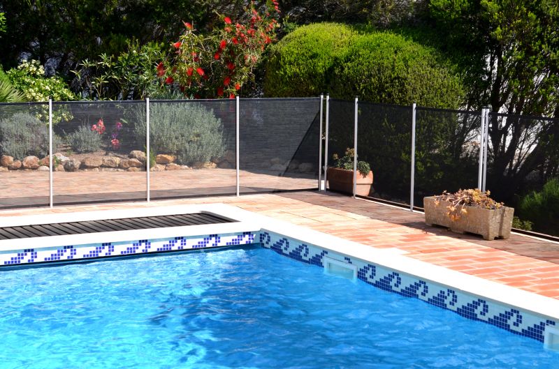 Pool Area with Mesh Fence